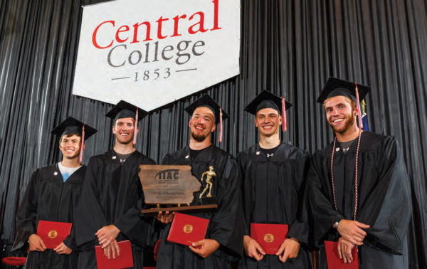 5 senior members of the Men's Track squad pose at graduation with their 2016 Iowa Conference championship trophy.